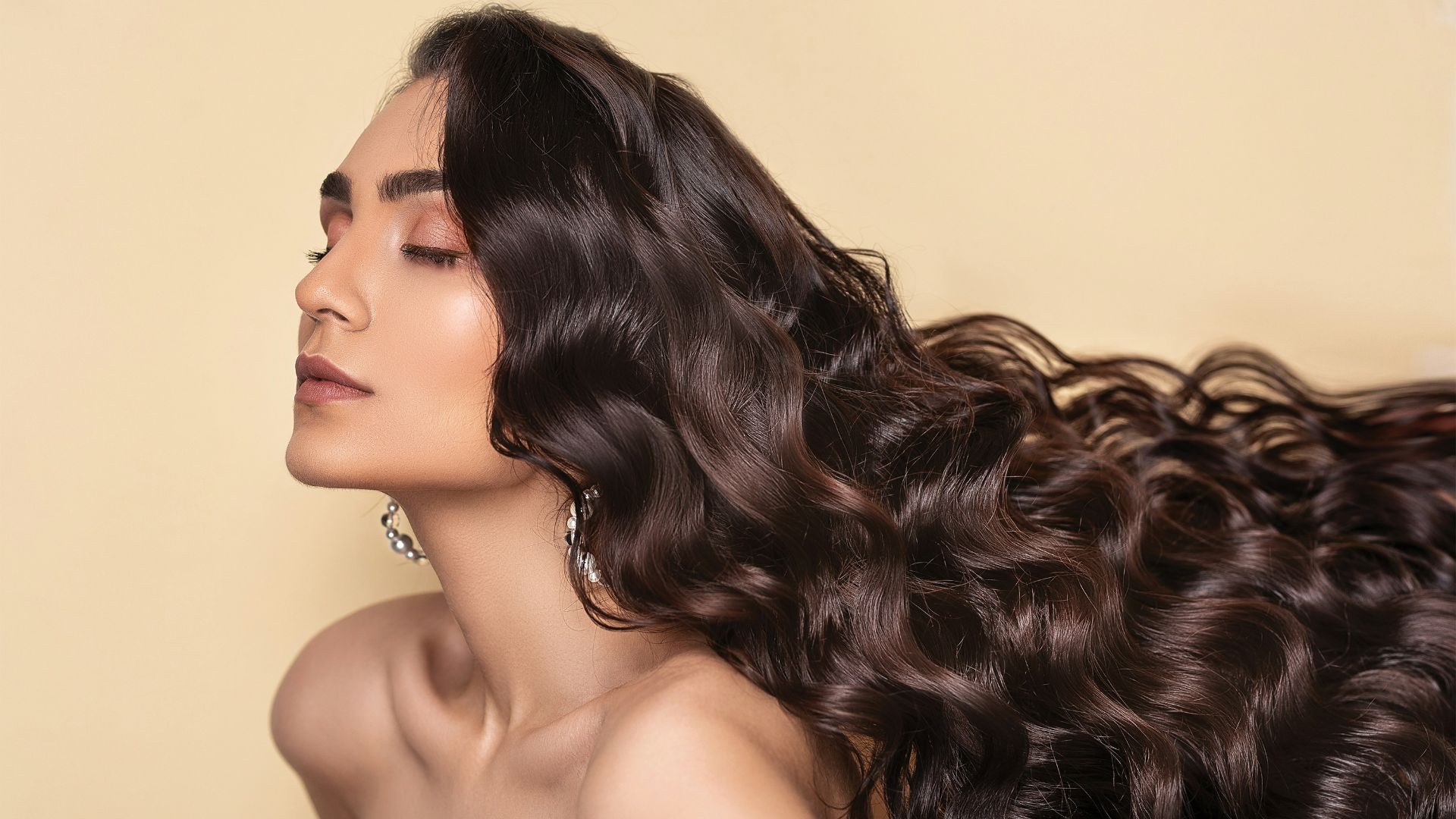 topless woman with eyes closed