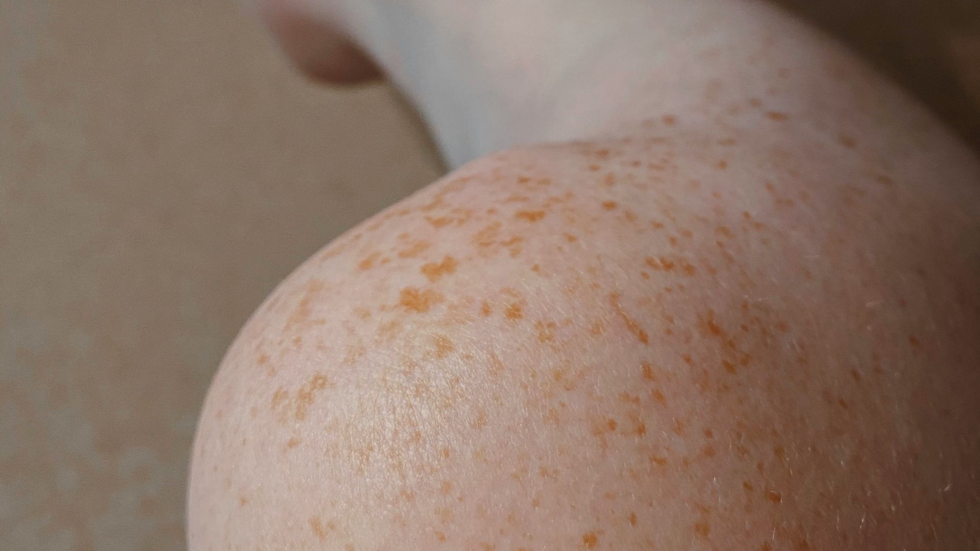 topless woman with brown hair