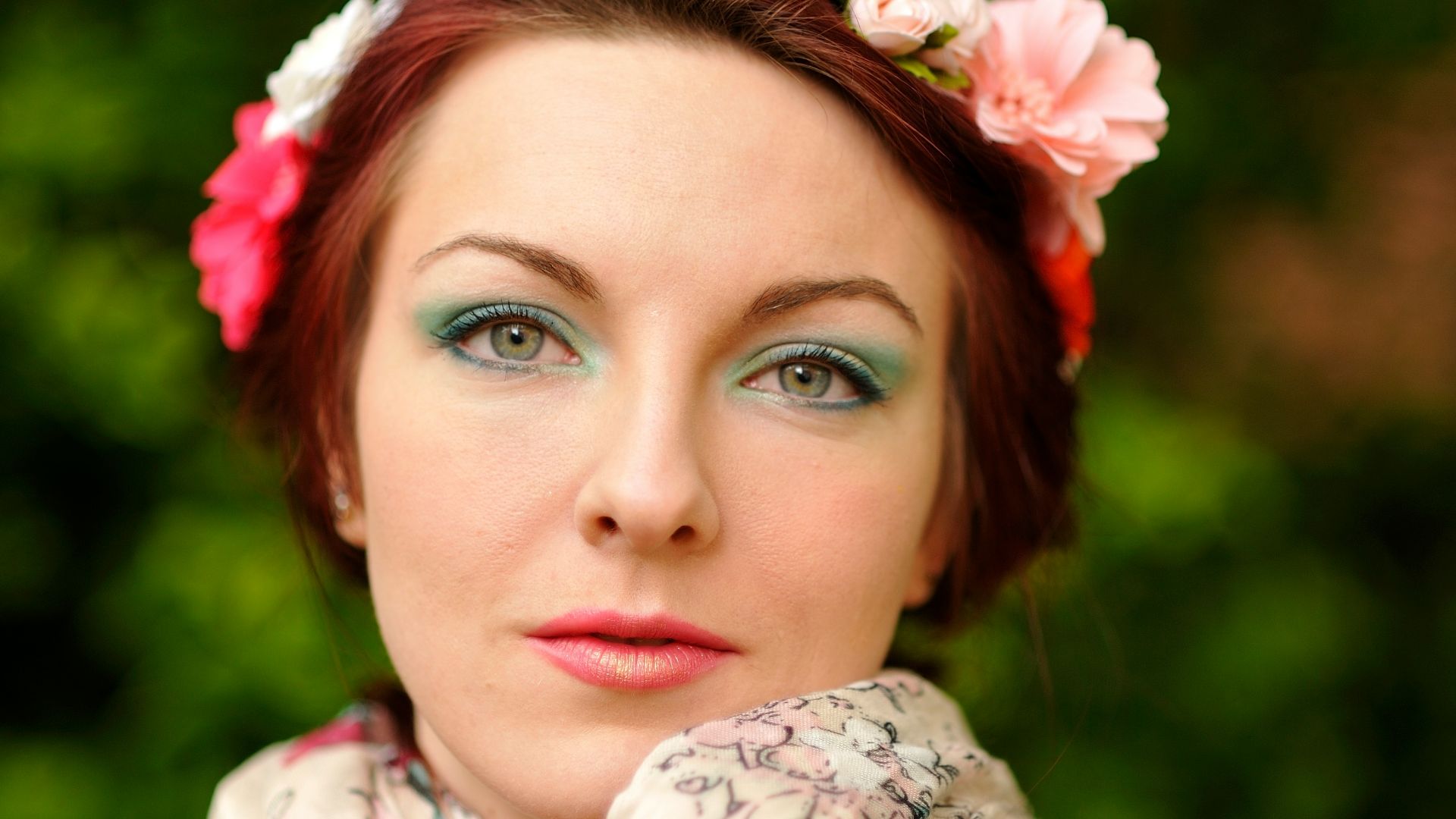 woman in white and pink floral hijab