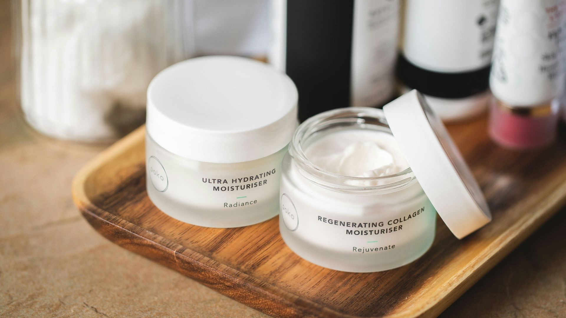 white and clear glass container on brown wooden table