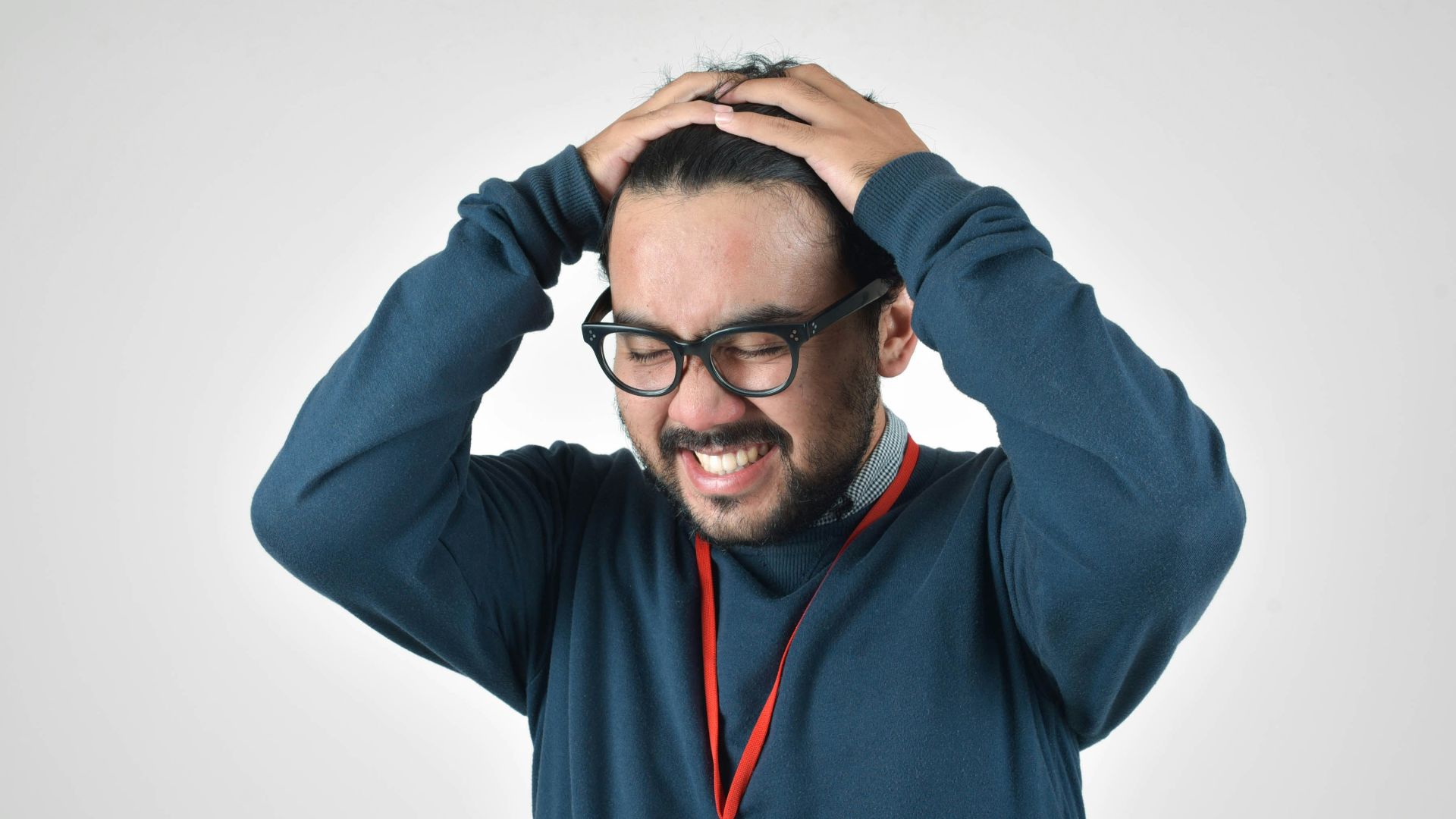 man in bluee ssweater