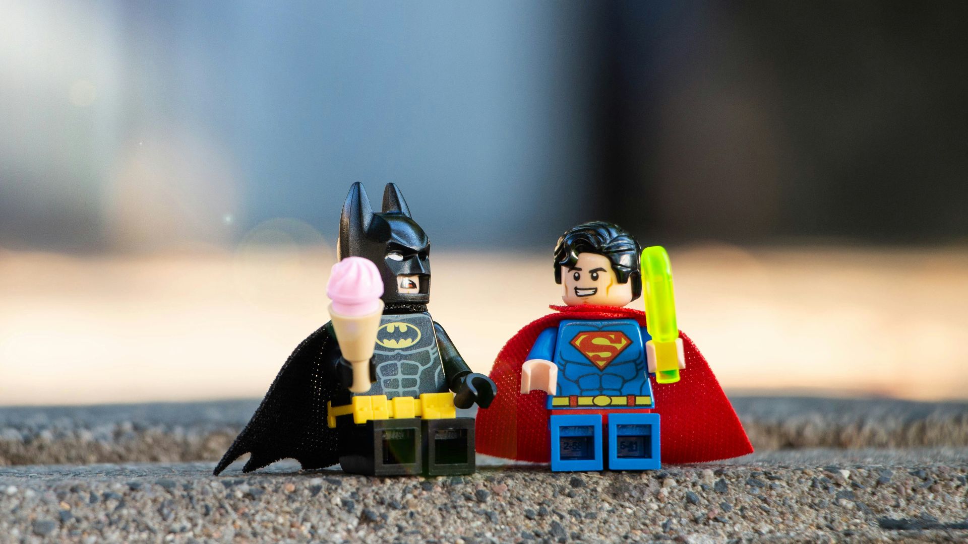 lego mini figure on brown sand