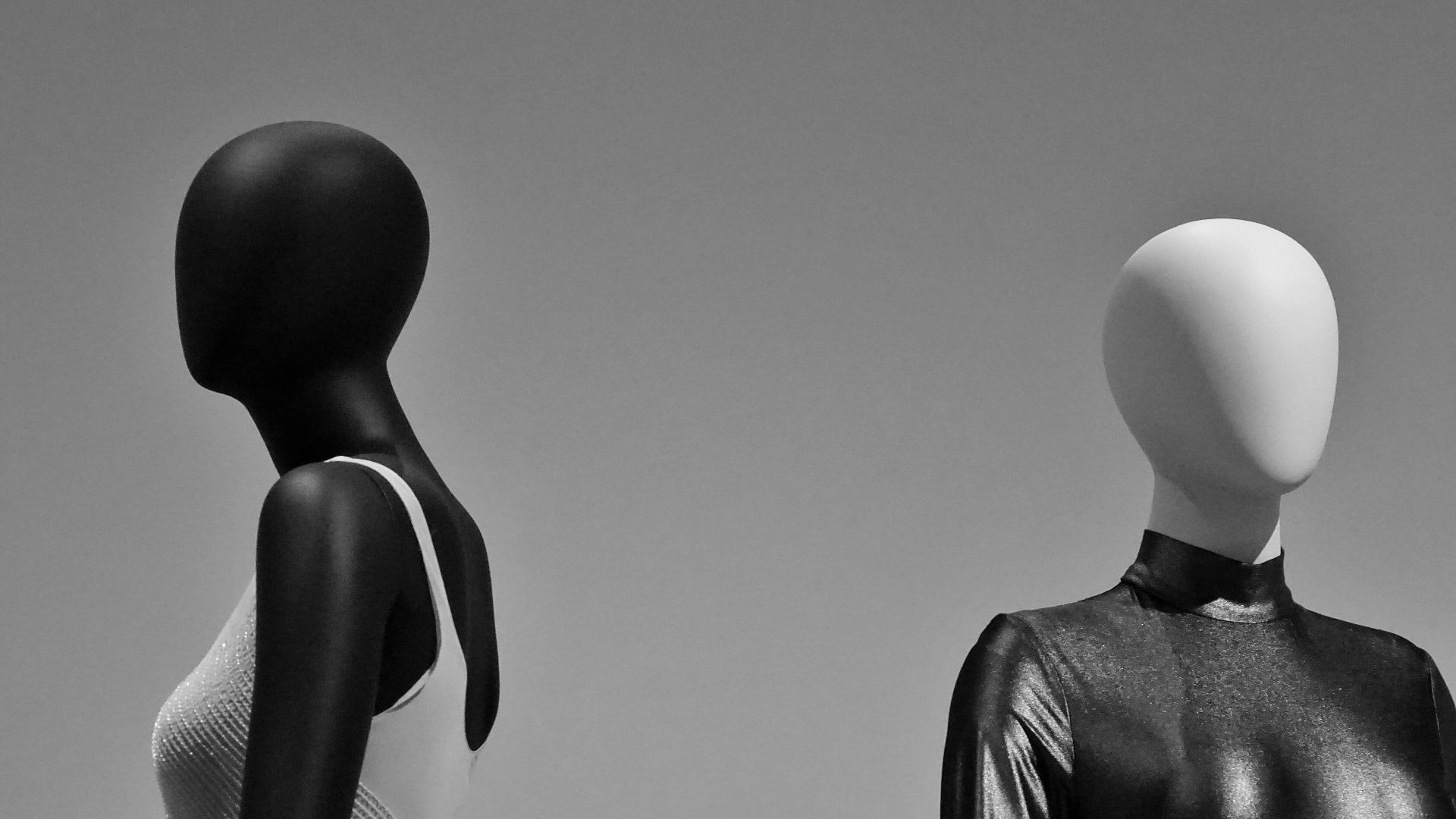 two black and white body dresses