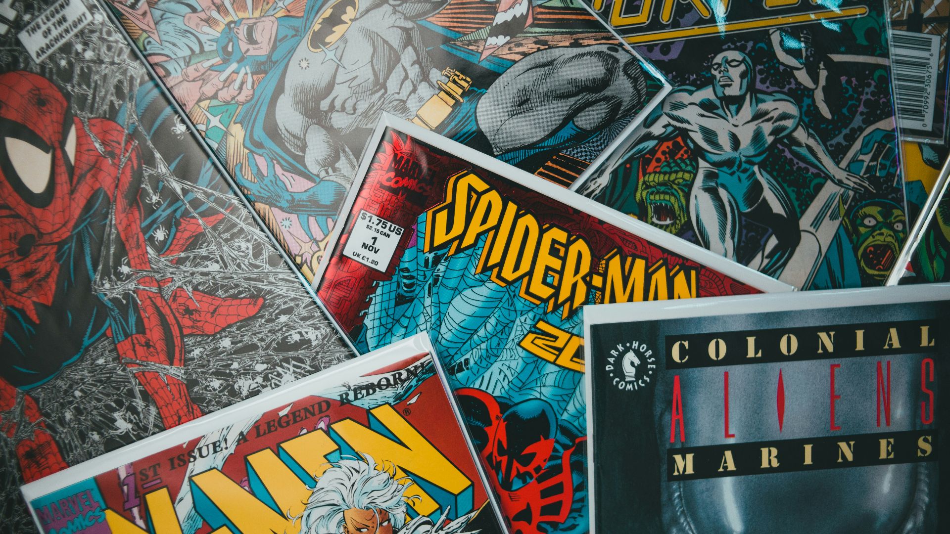 a pile of comics sitting next to each other