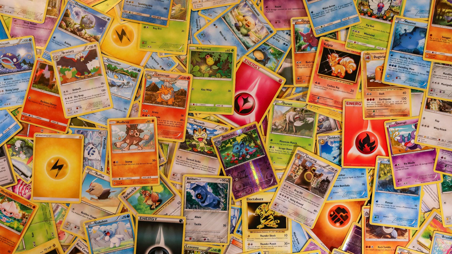 red ceramic mug on brown wooden table