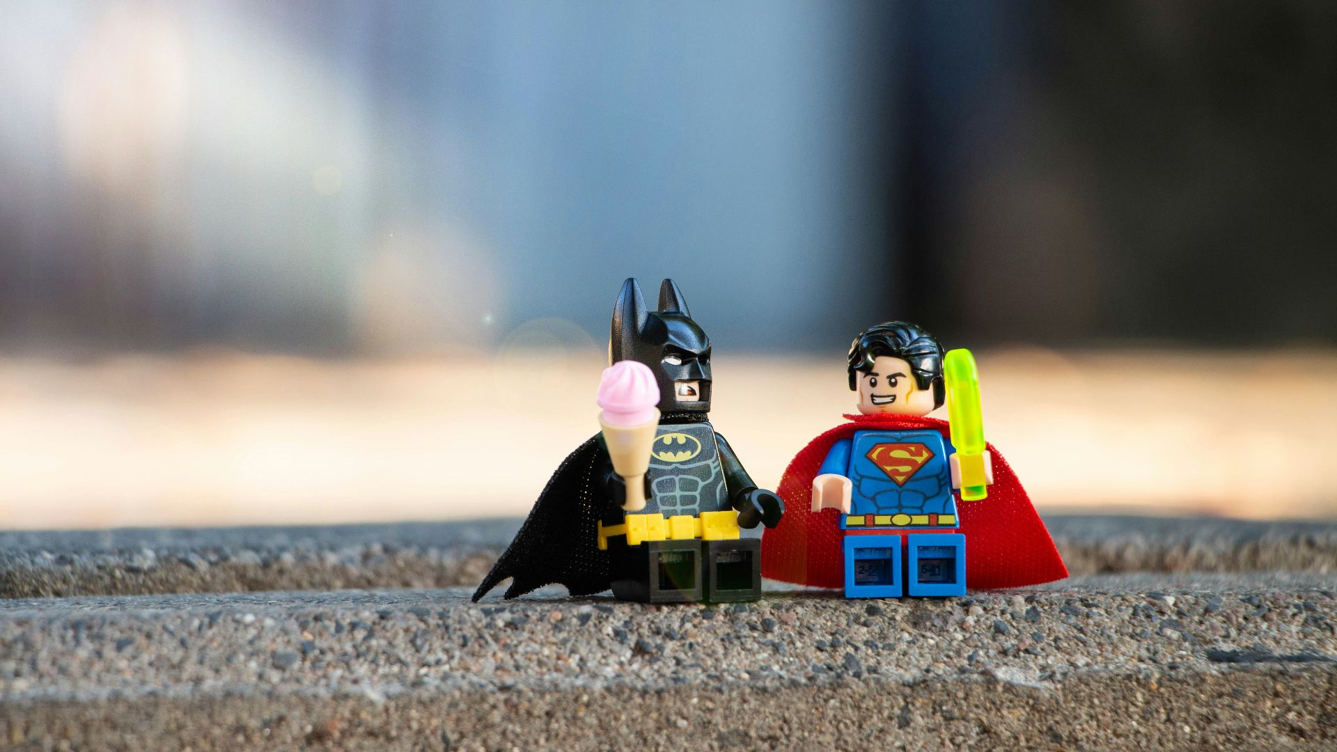 lego mini figure on brown sand