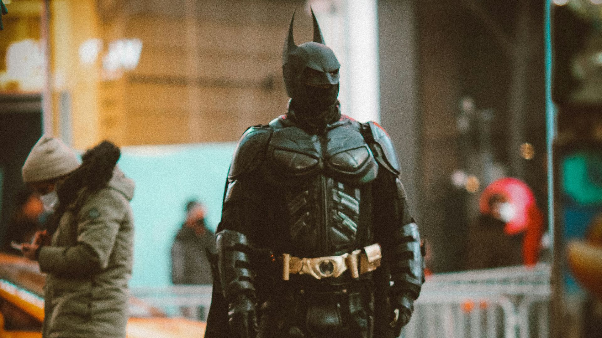 police man walking on street during daytime