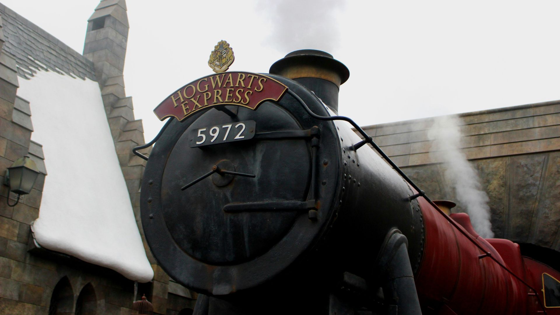 low angle photography of black and red freight train