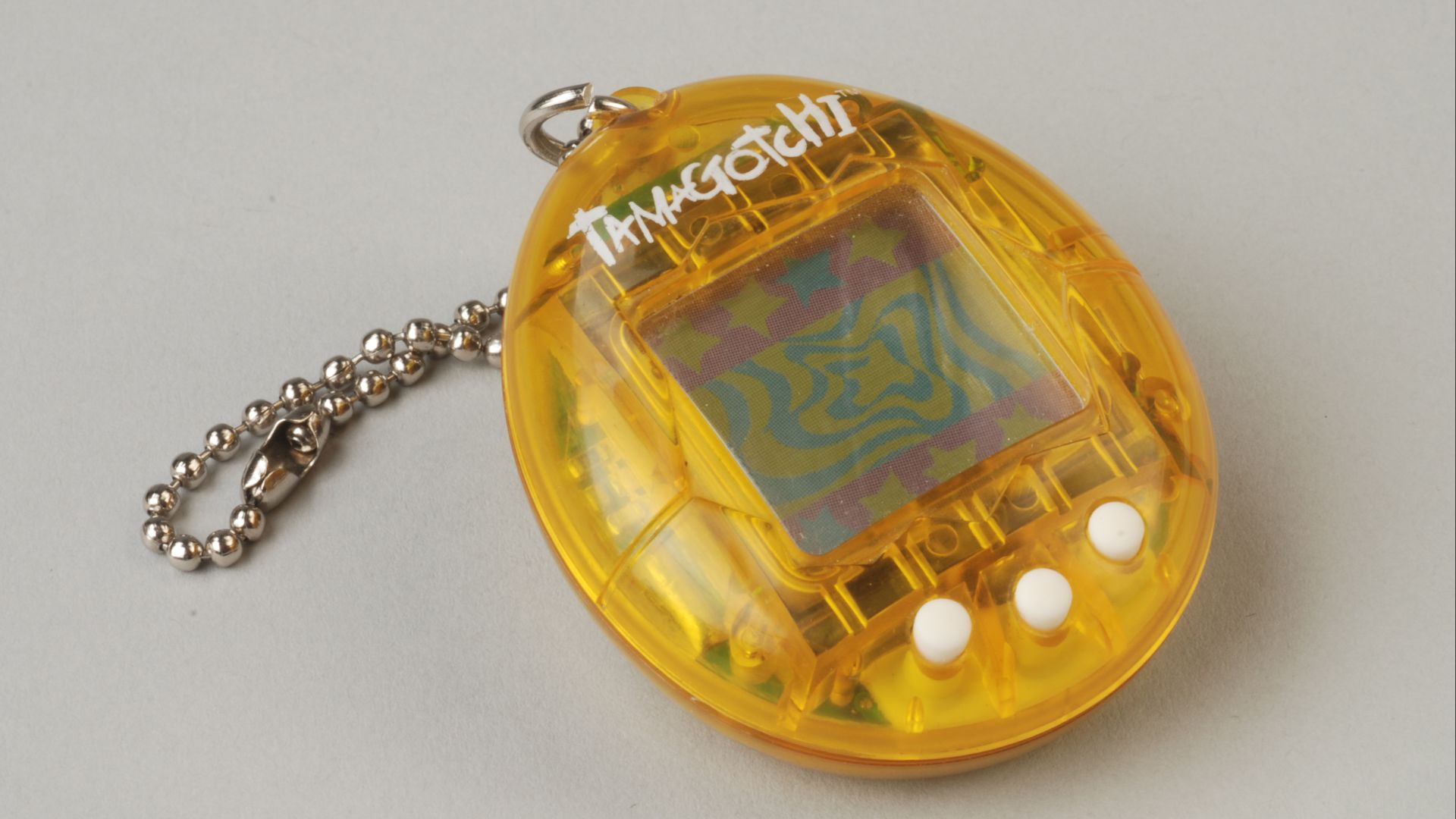 File:Gele tamagotchi, objectnr 78041.JPG