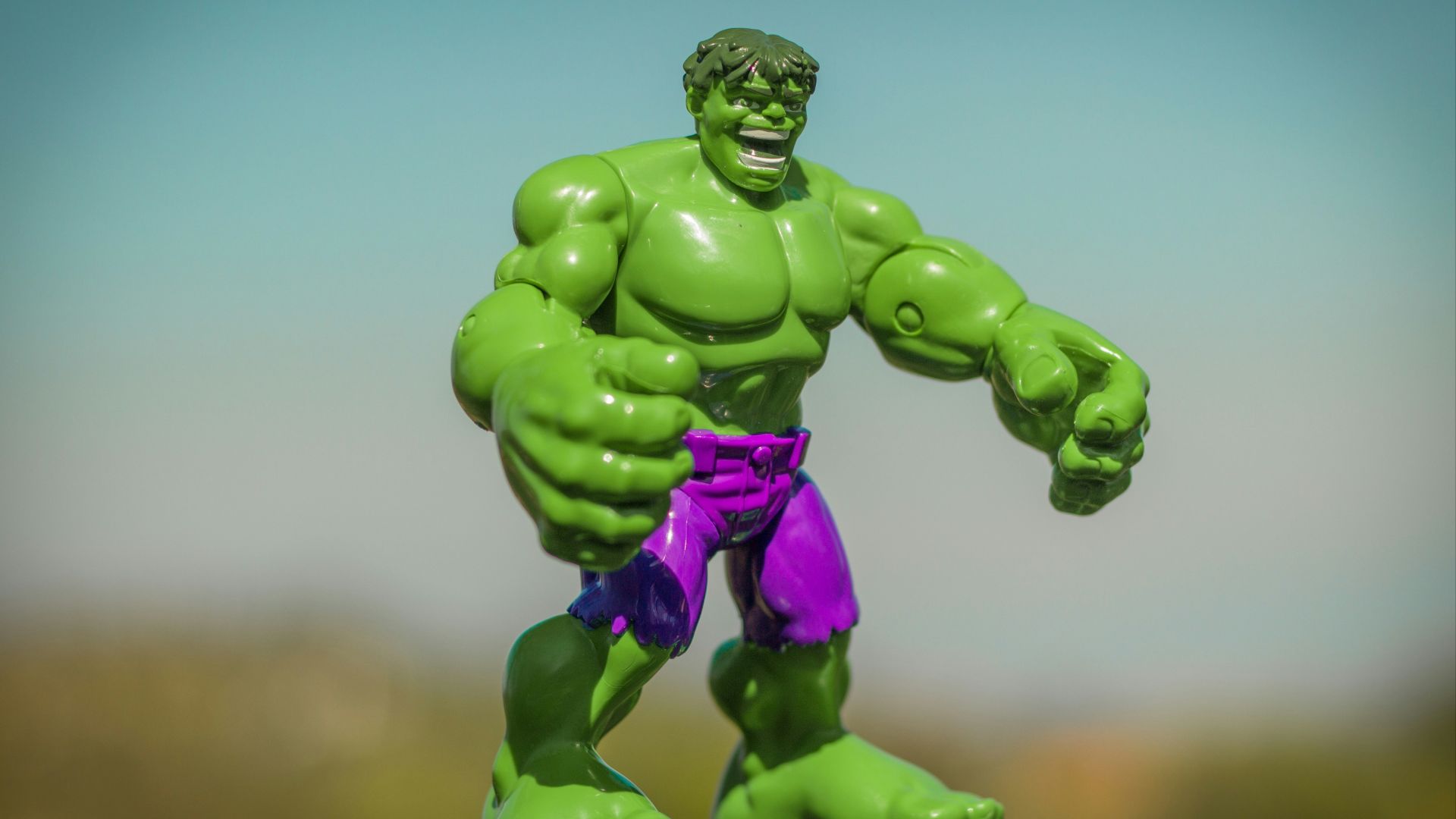 Marvel Hulk action figure standing on gray surface