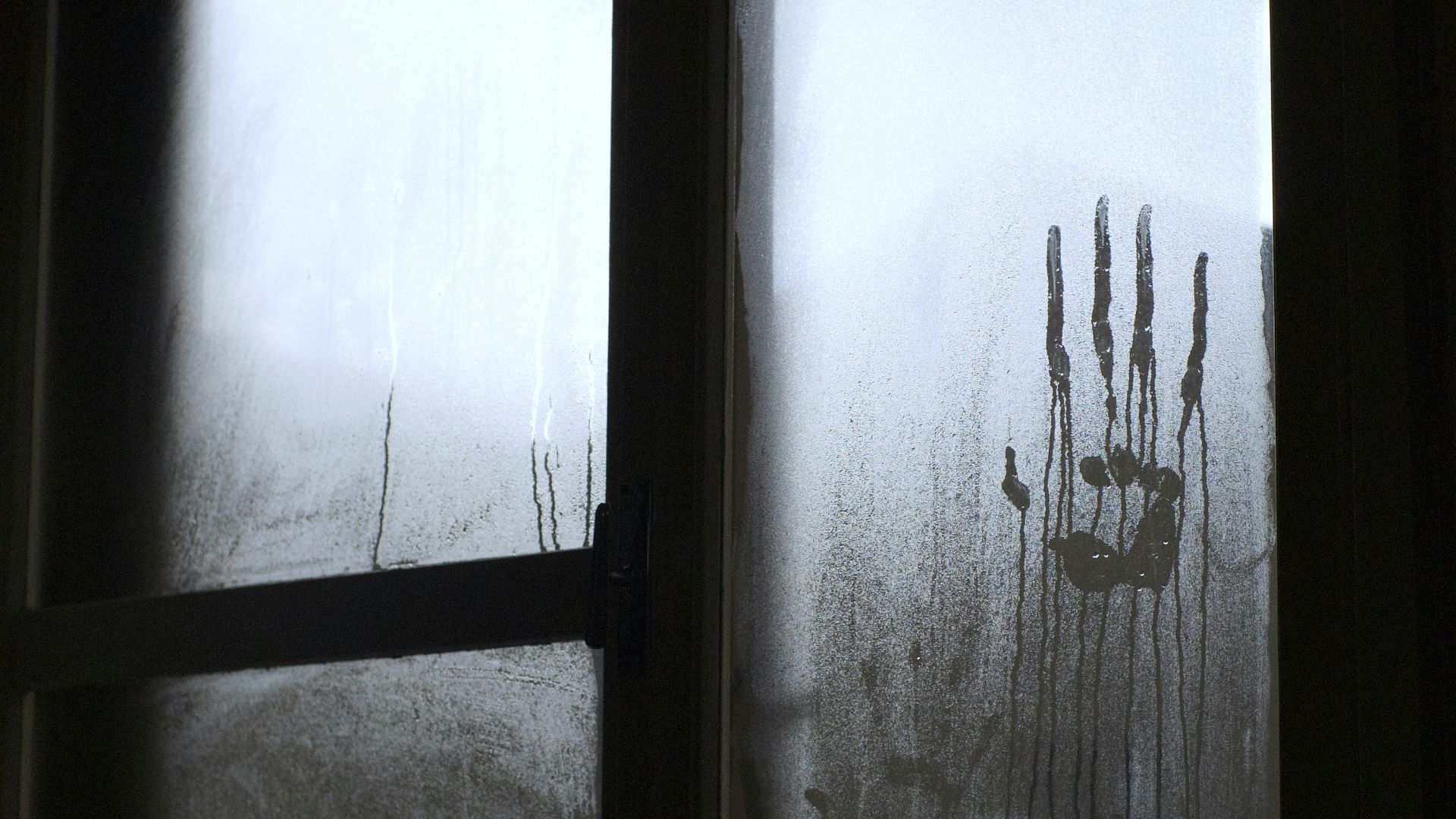 black wooden framed glass window