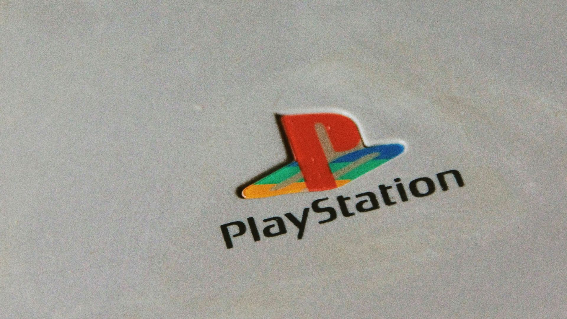 orange and green logo on white paper