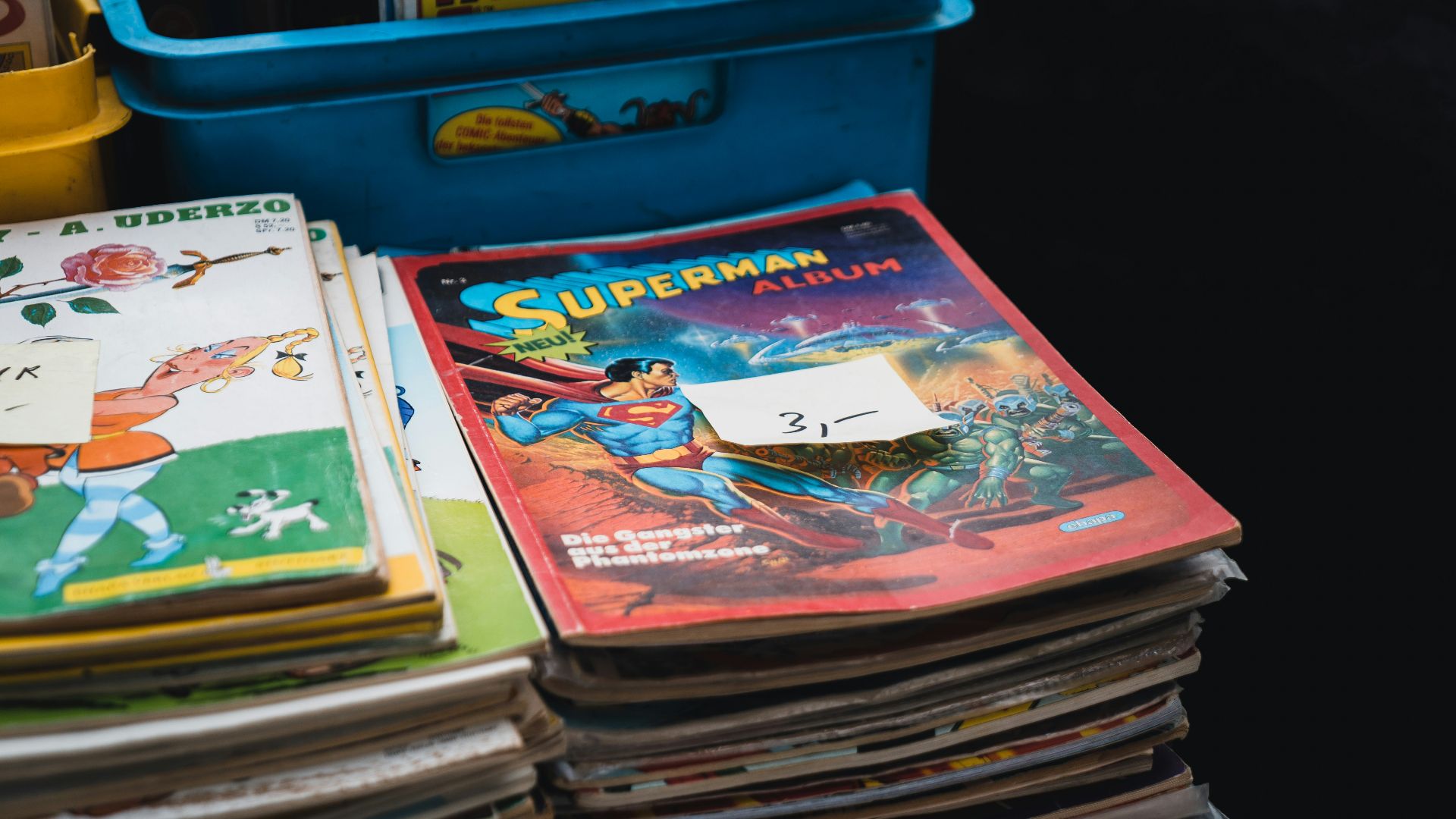 a stack of children's books sitting on top of a table
