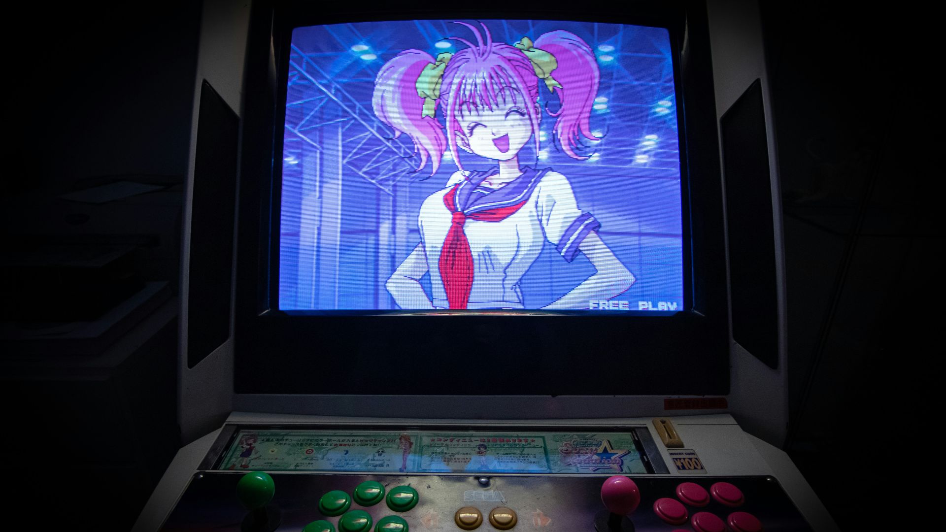 black flat screen tv turned on showing woman in blue dress