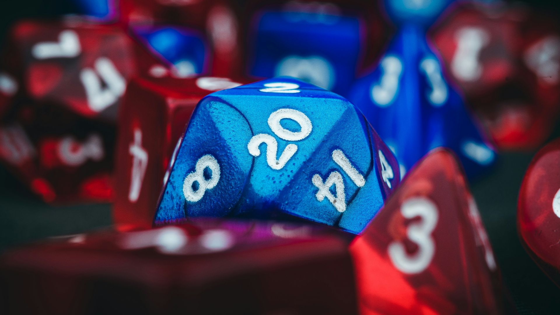 a close up of a blue and red dice