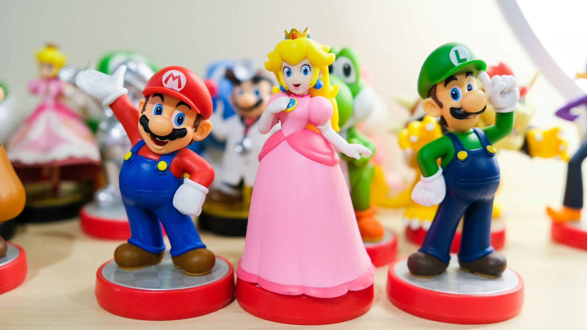 Mario, Luigi, and Princess Peach figurines