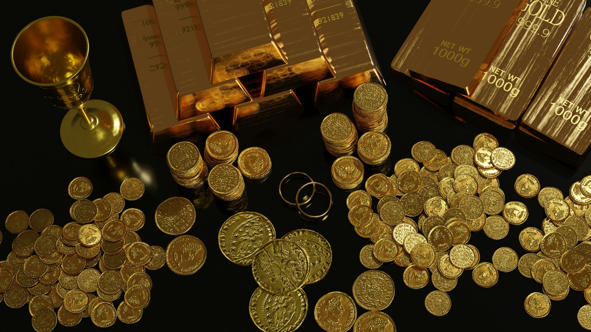a table topped with lots of gold coins