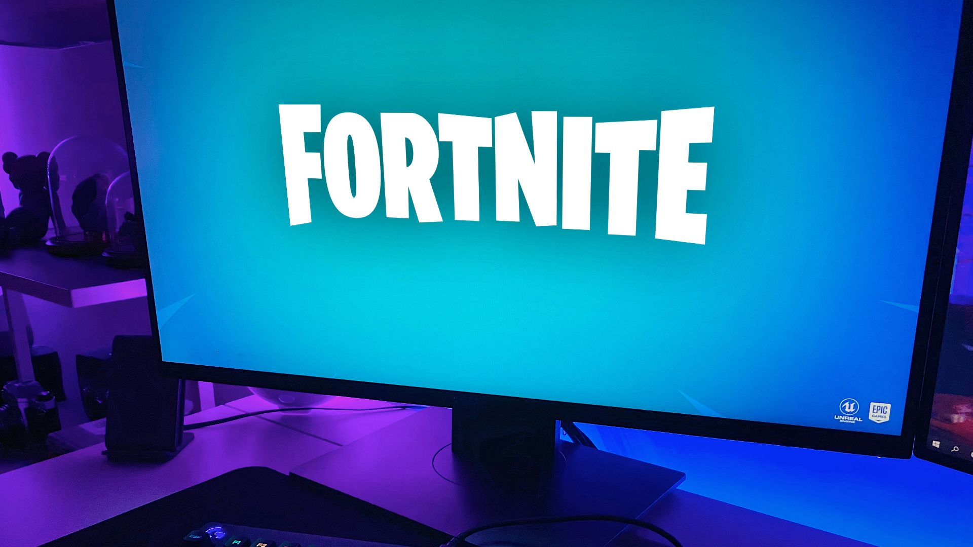 black flat screen computer monitor with black computer keyboard