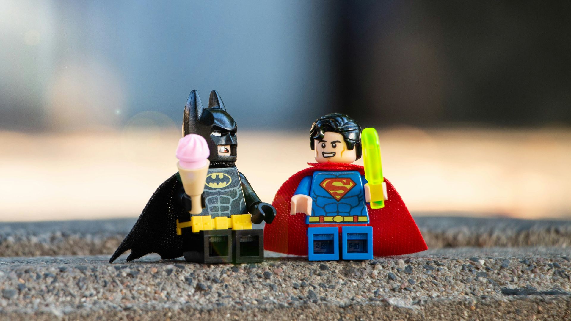 lego mini figure on brown sand