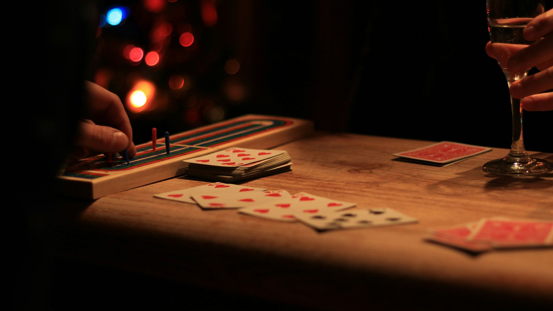 playing cards on brown wooden table