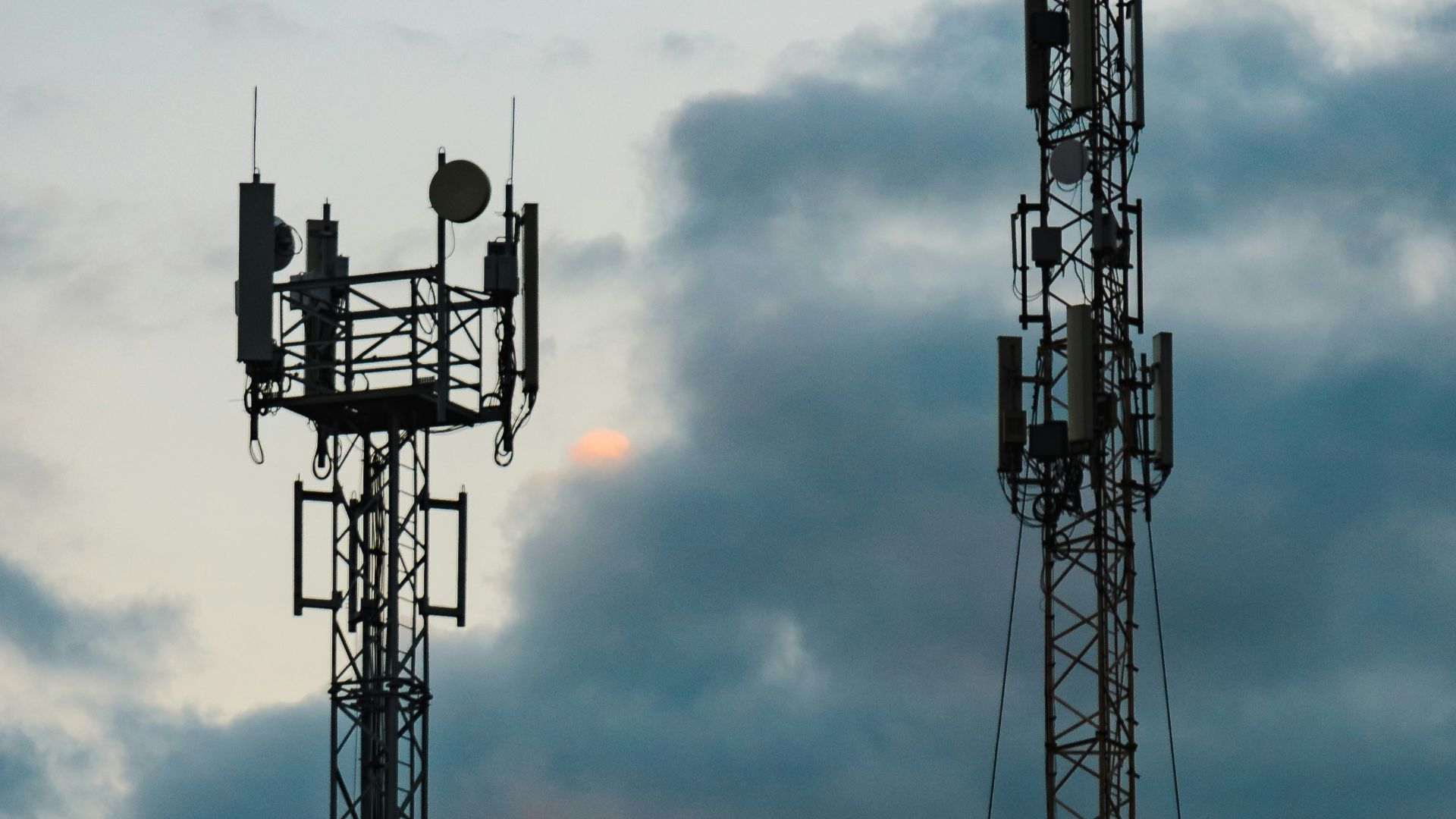 a couple of cell towers sitting next to each other