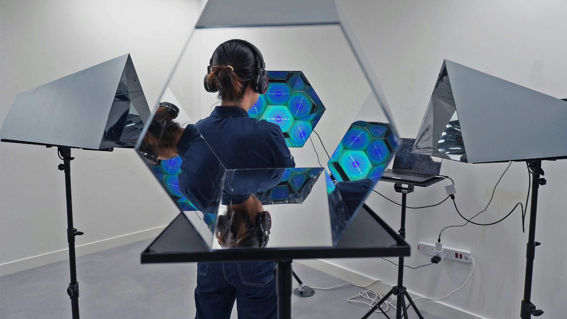 a man standing in front of a mirror in a room