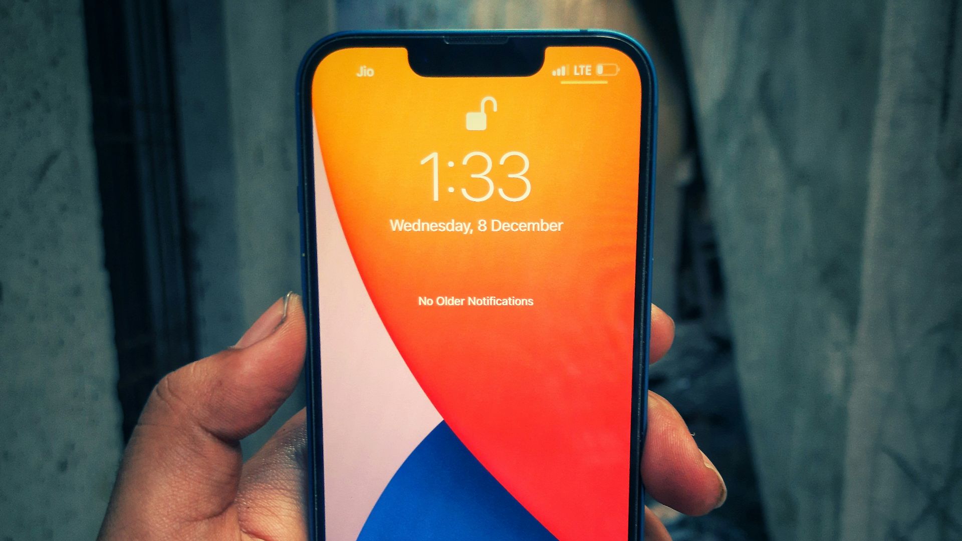 a person holding an iphone in their hand