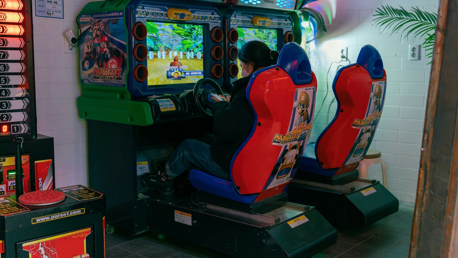 a couple of people that are playing a video game