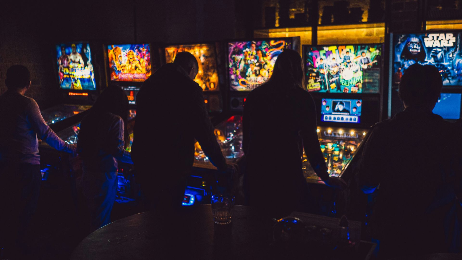 people sitting on chair in front of table