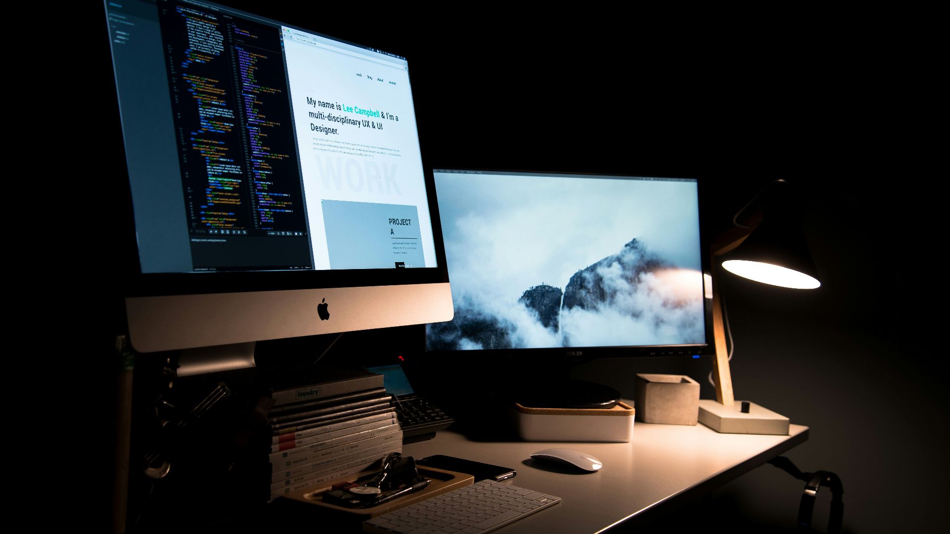 silver iMac turned on inside room