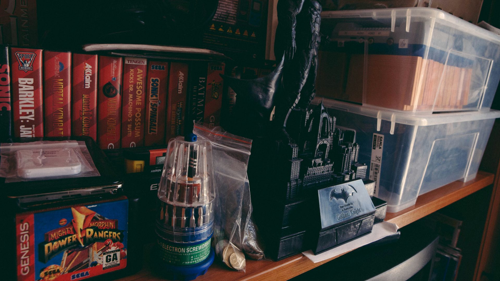 a shelf filled with lots of different types of items