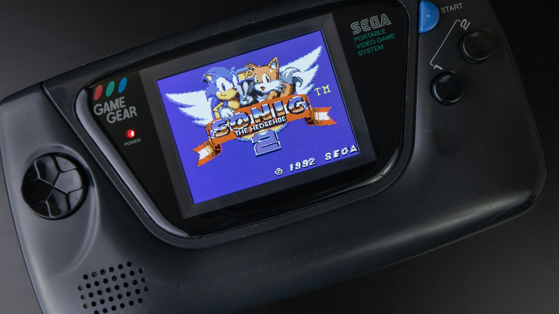 black sony digital device on black surface