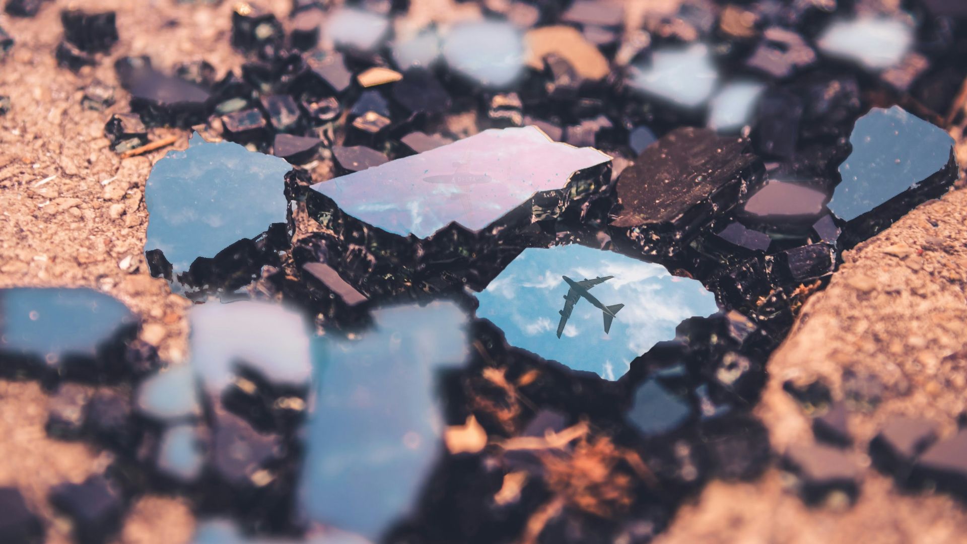 Macro Photography of broken rock with airliner reflection