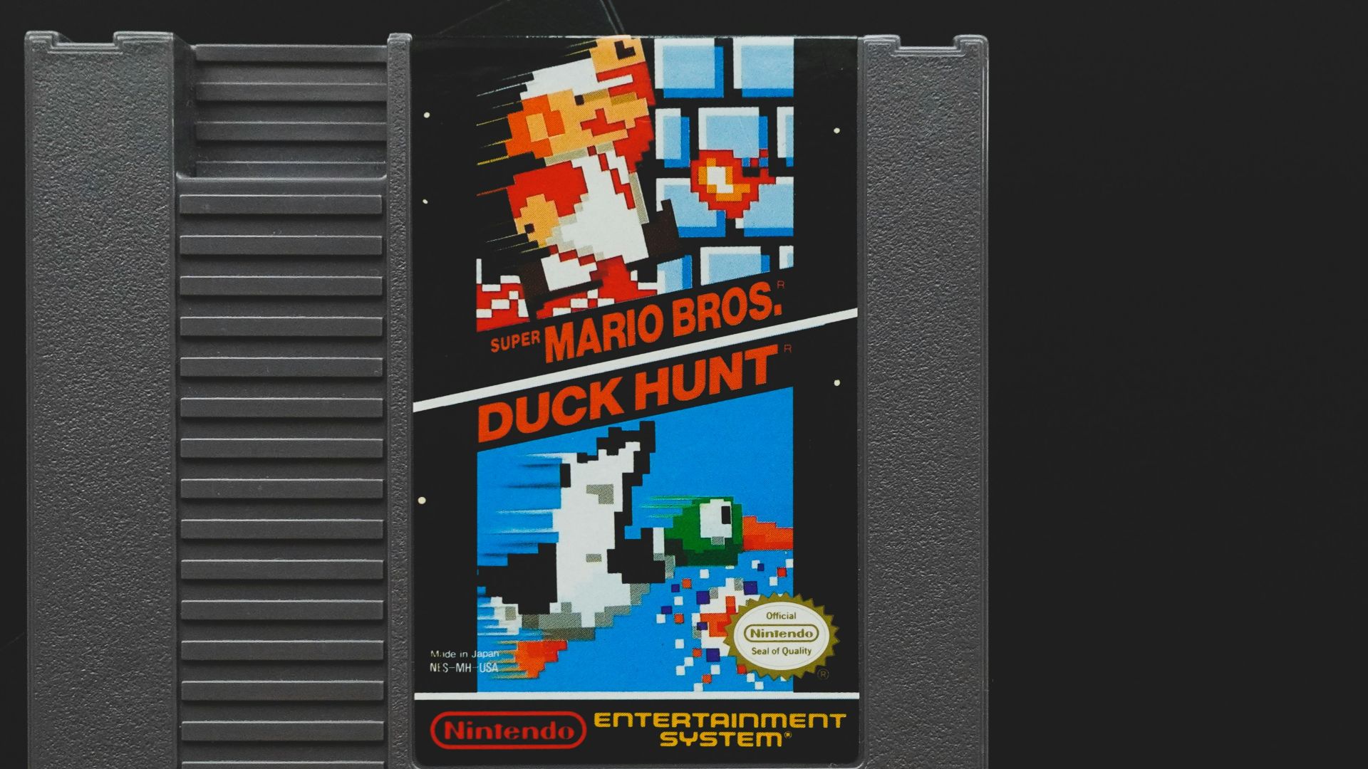 nintendo game boy cartridge on black surface