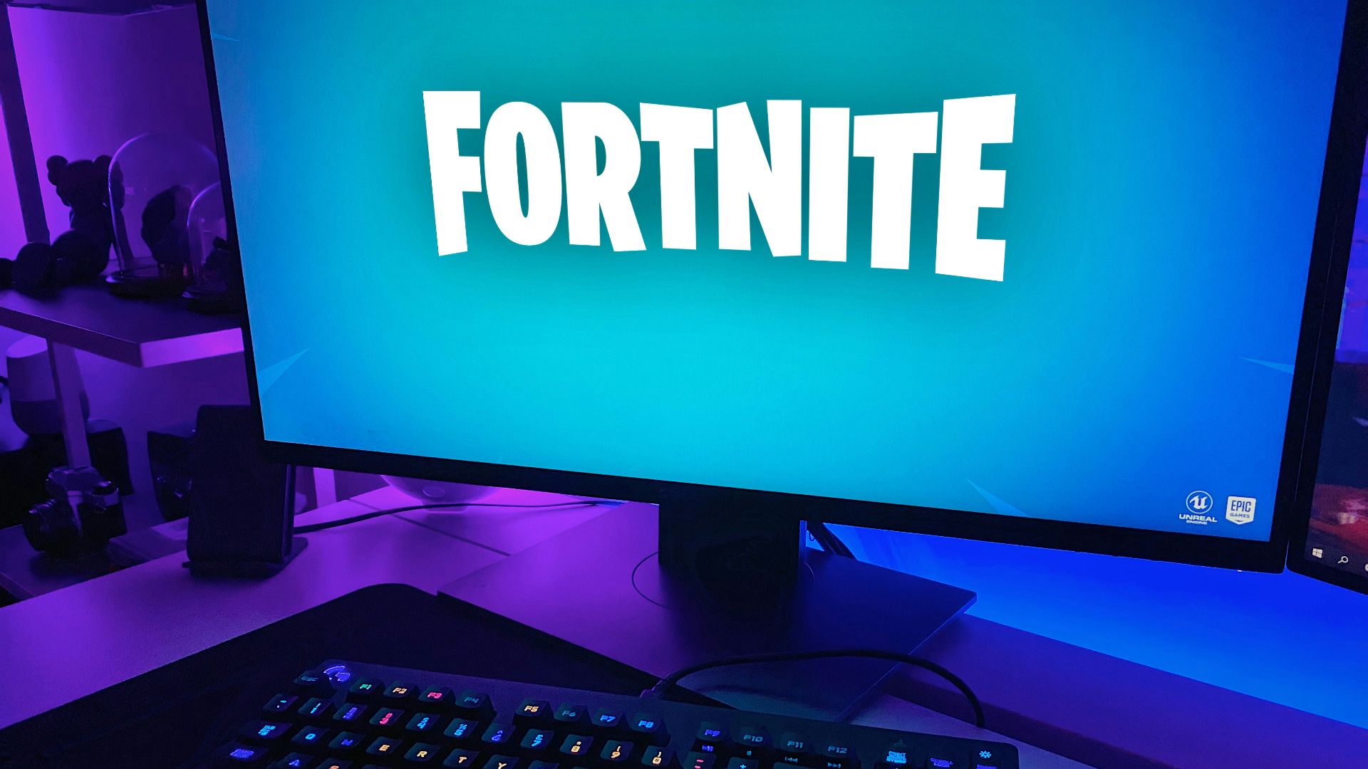black flat screen computer monitor with black computer keyboard