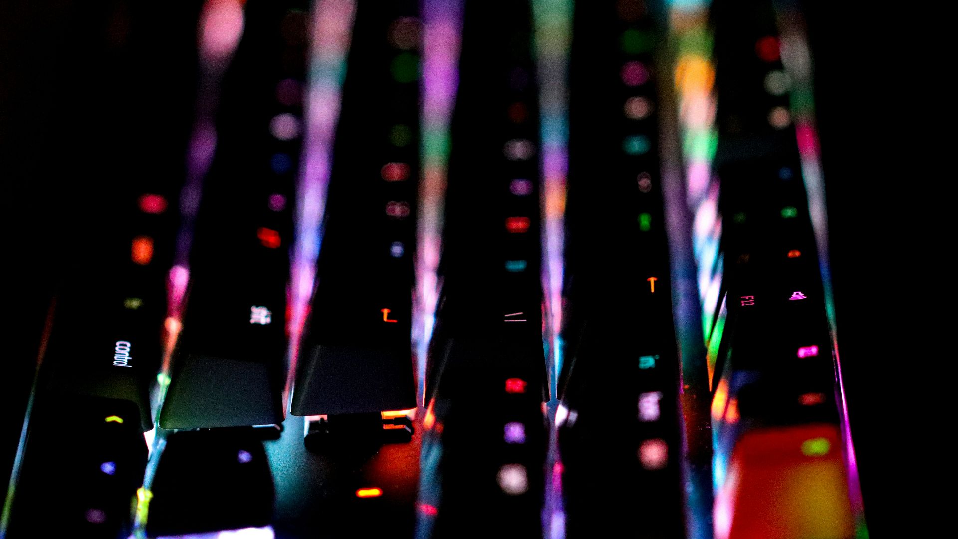 a close up of a keyboard with many colors on it