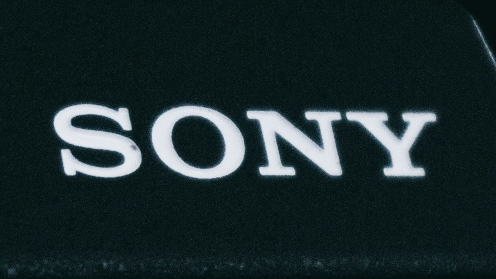 black nikon dslr camera on black background