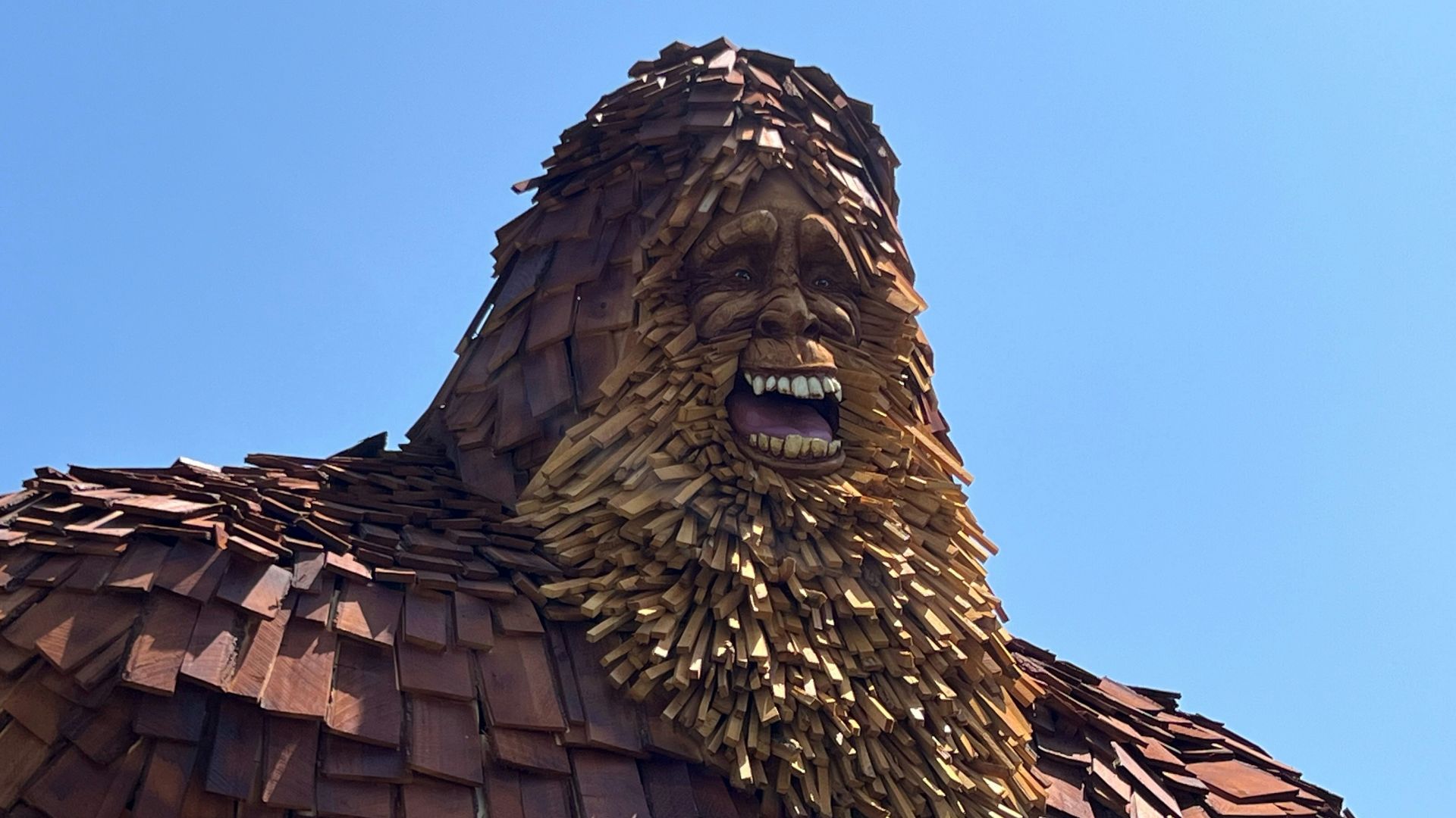 a large statue of a man with a beard