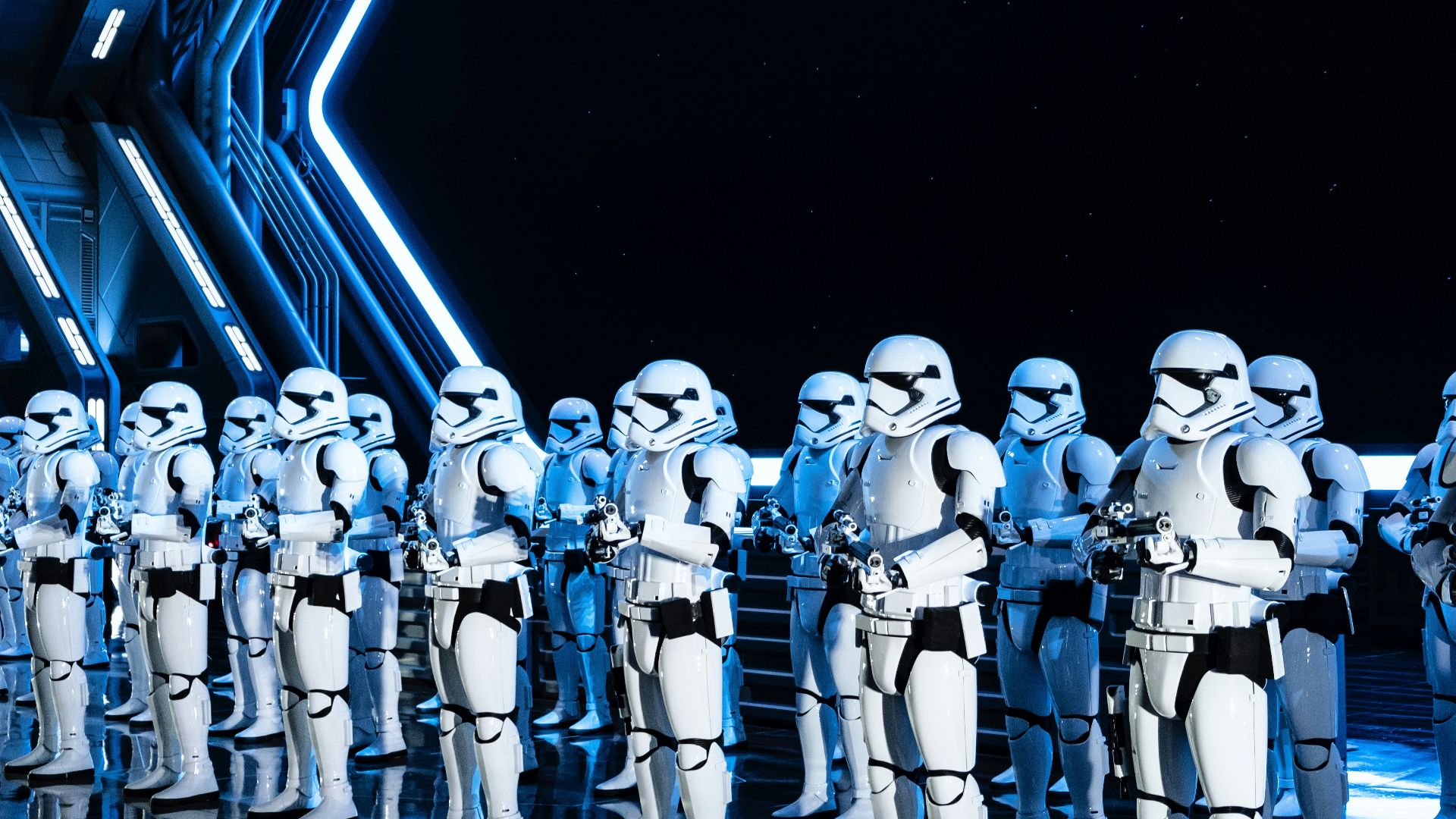 white robot toy on black background