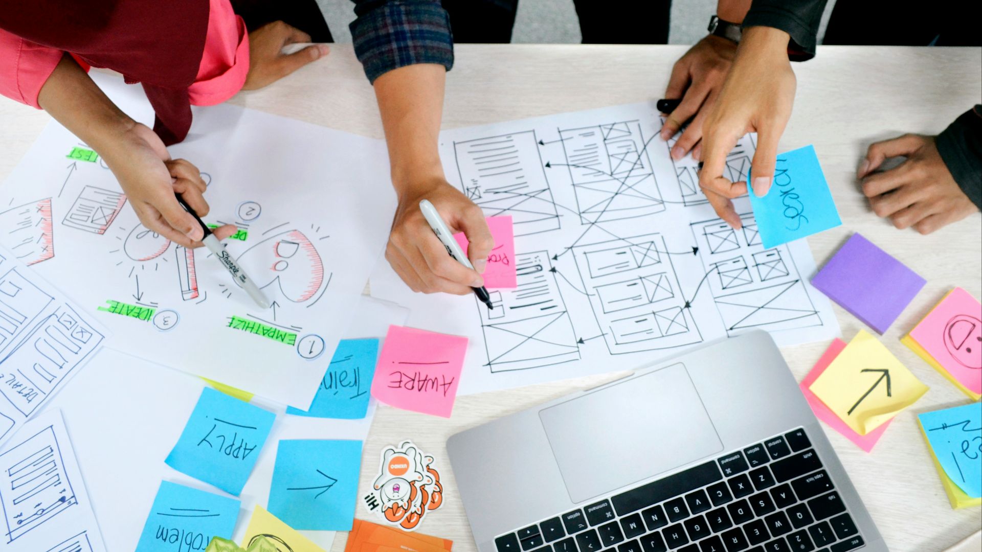 person writing on white paper