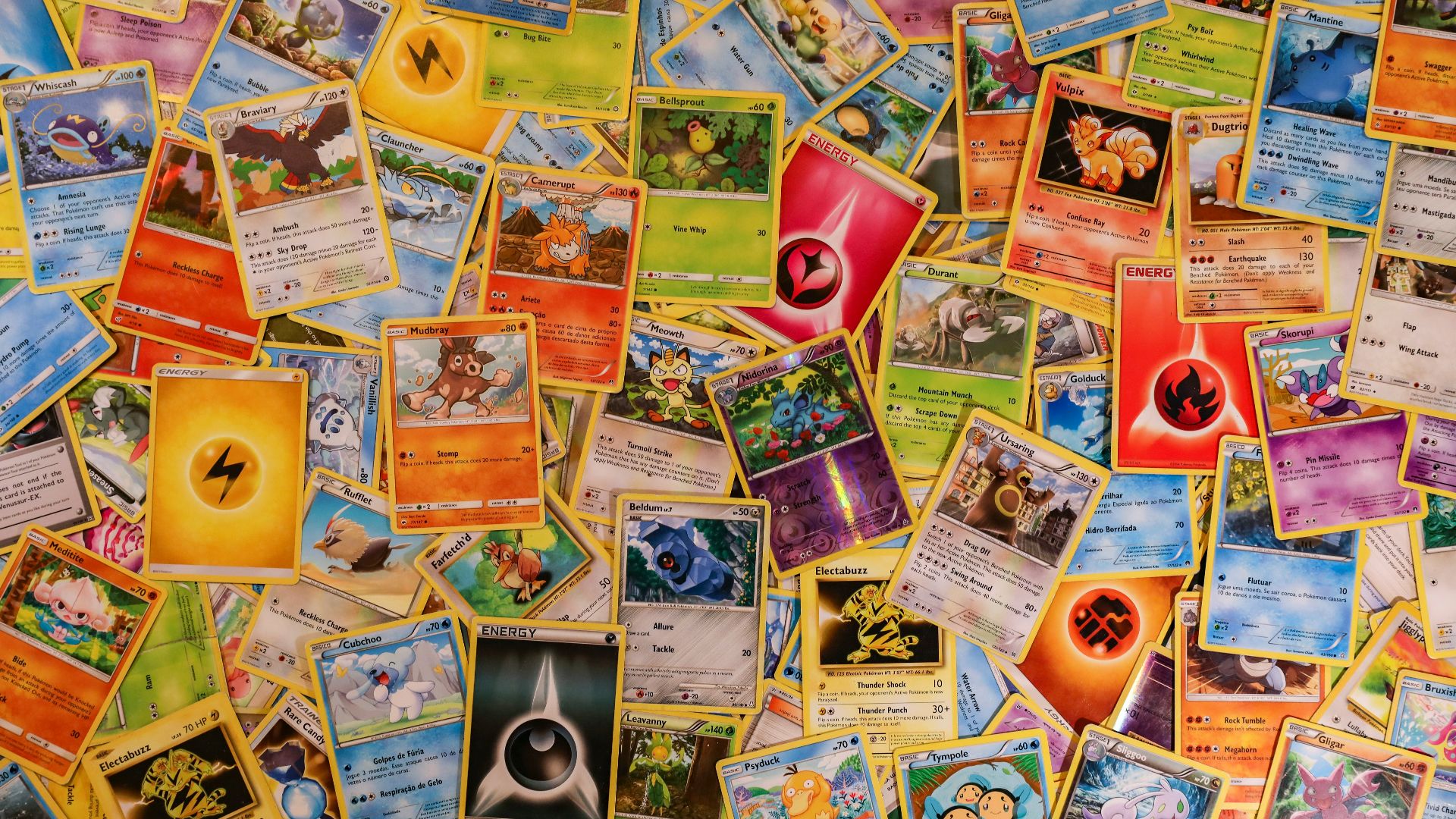 red ceramic mug on brown wooden table