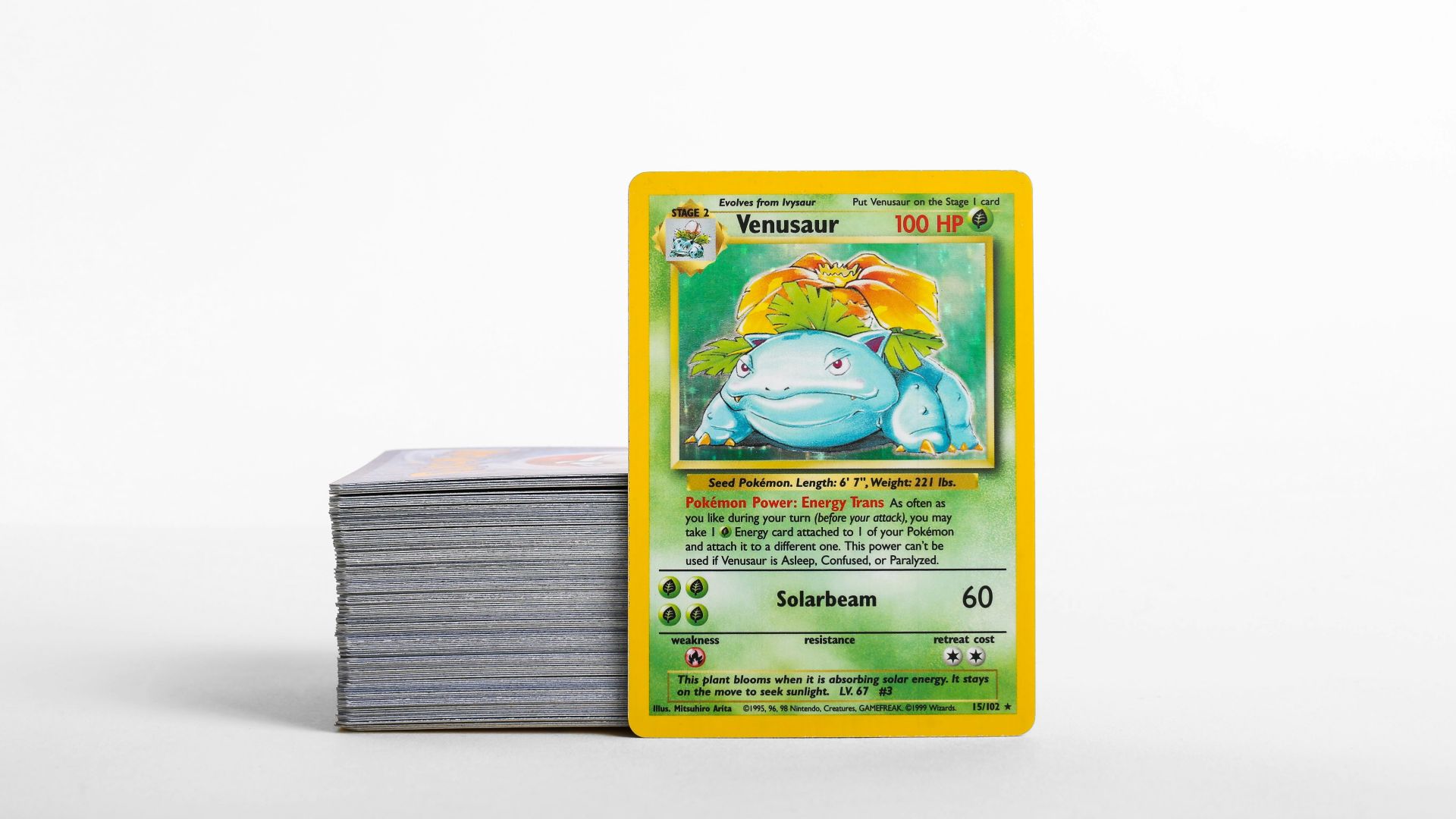 a stack of pokemon cards sitting on top of each other