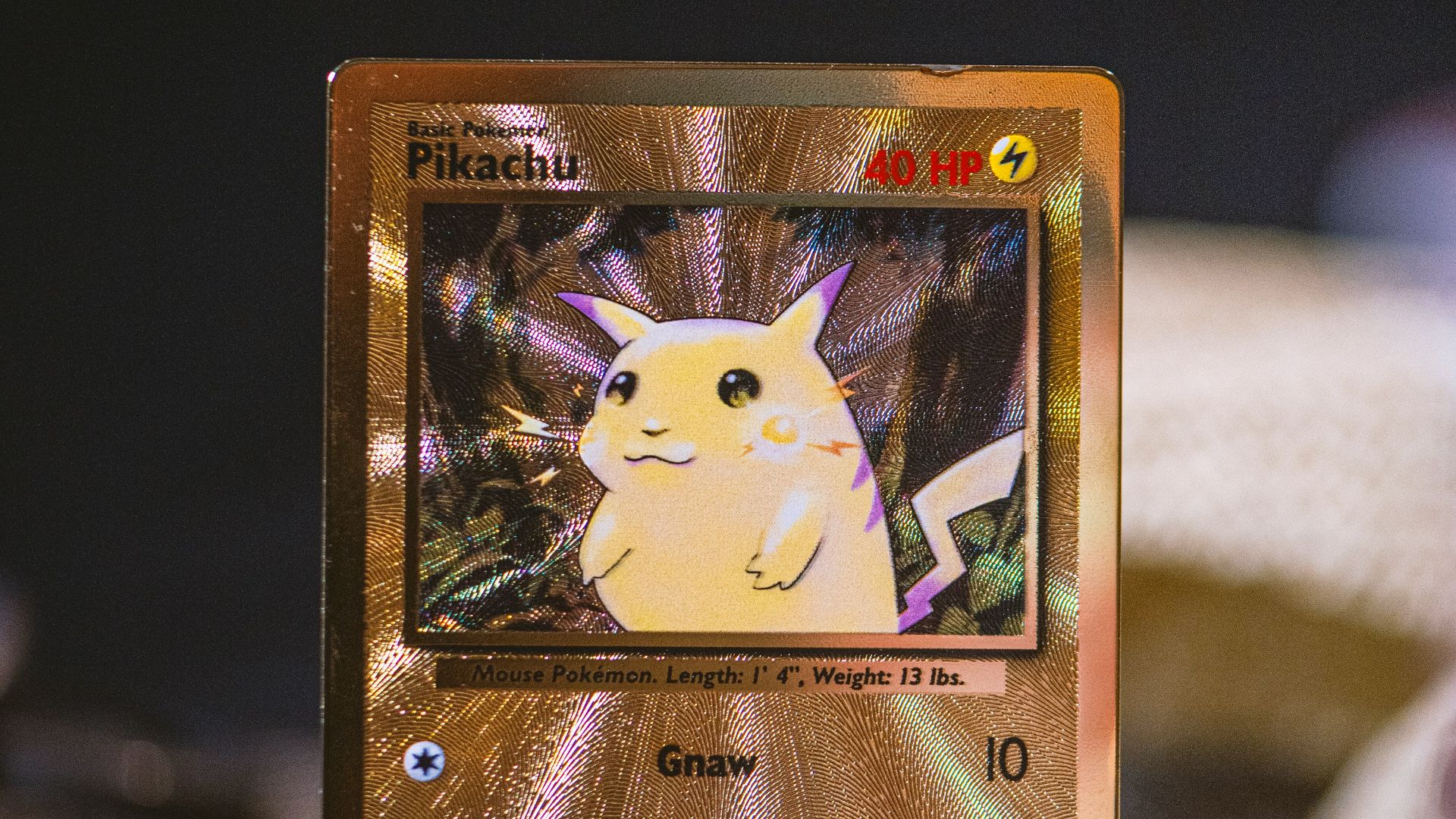 a pokemon card sitting on top of a table
