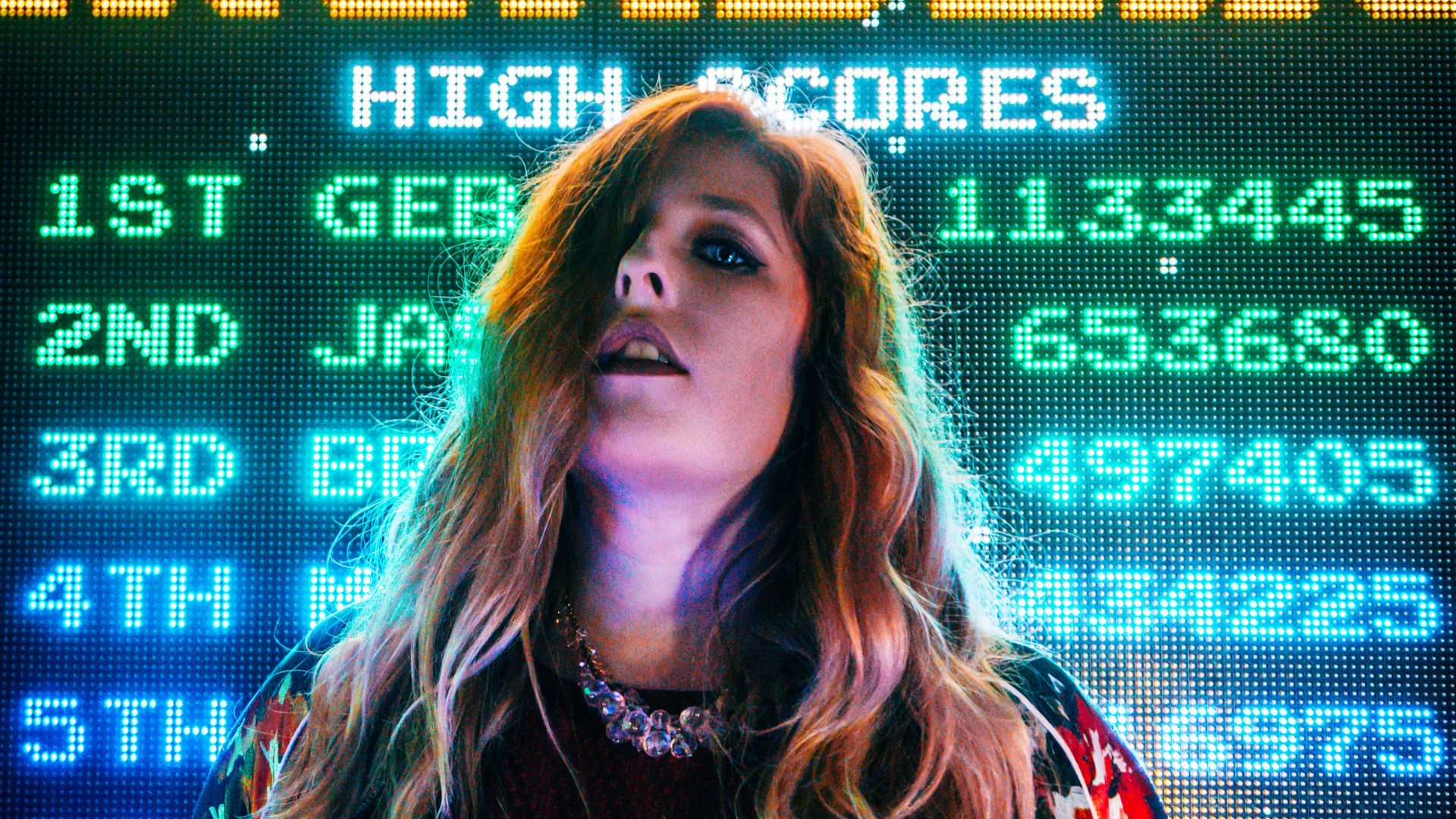 woman standing in signage