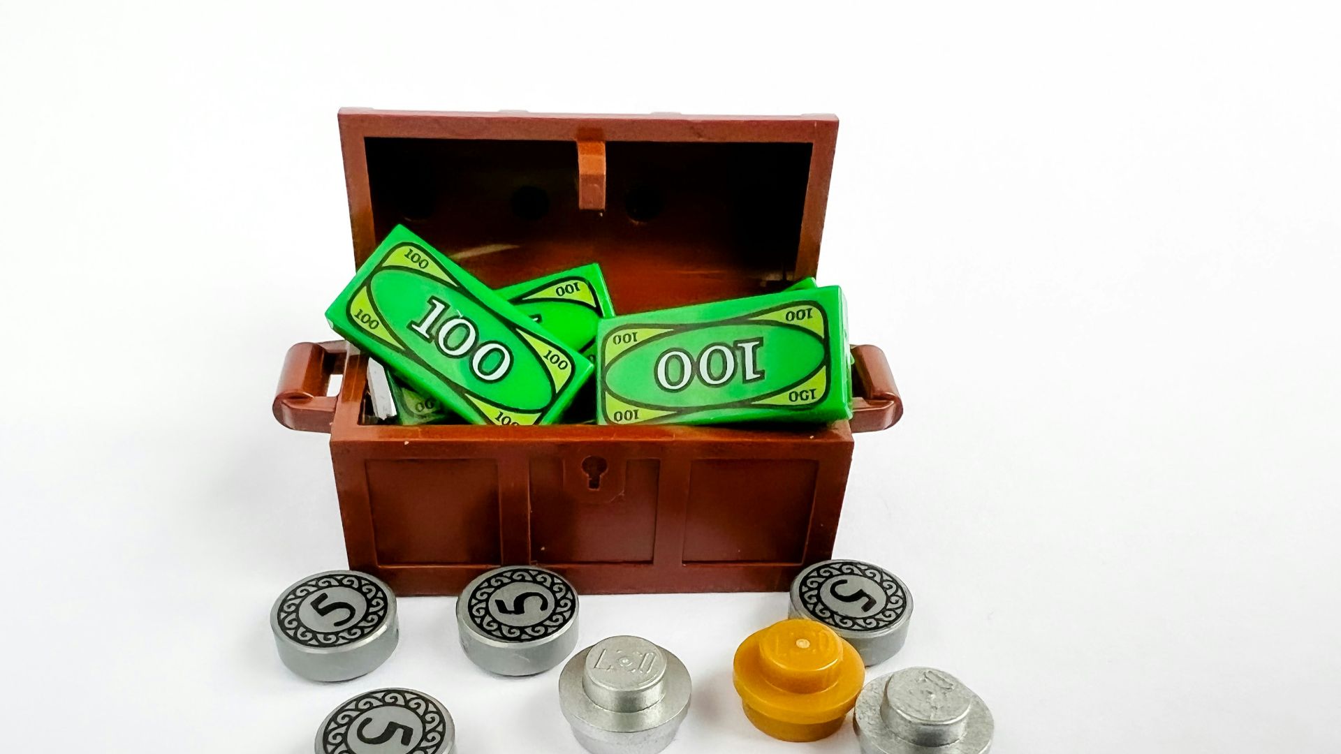 a wooden box filled with lots of green items