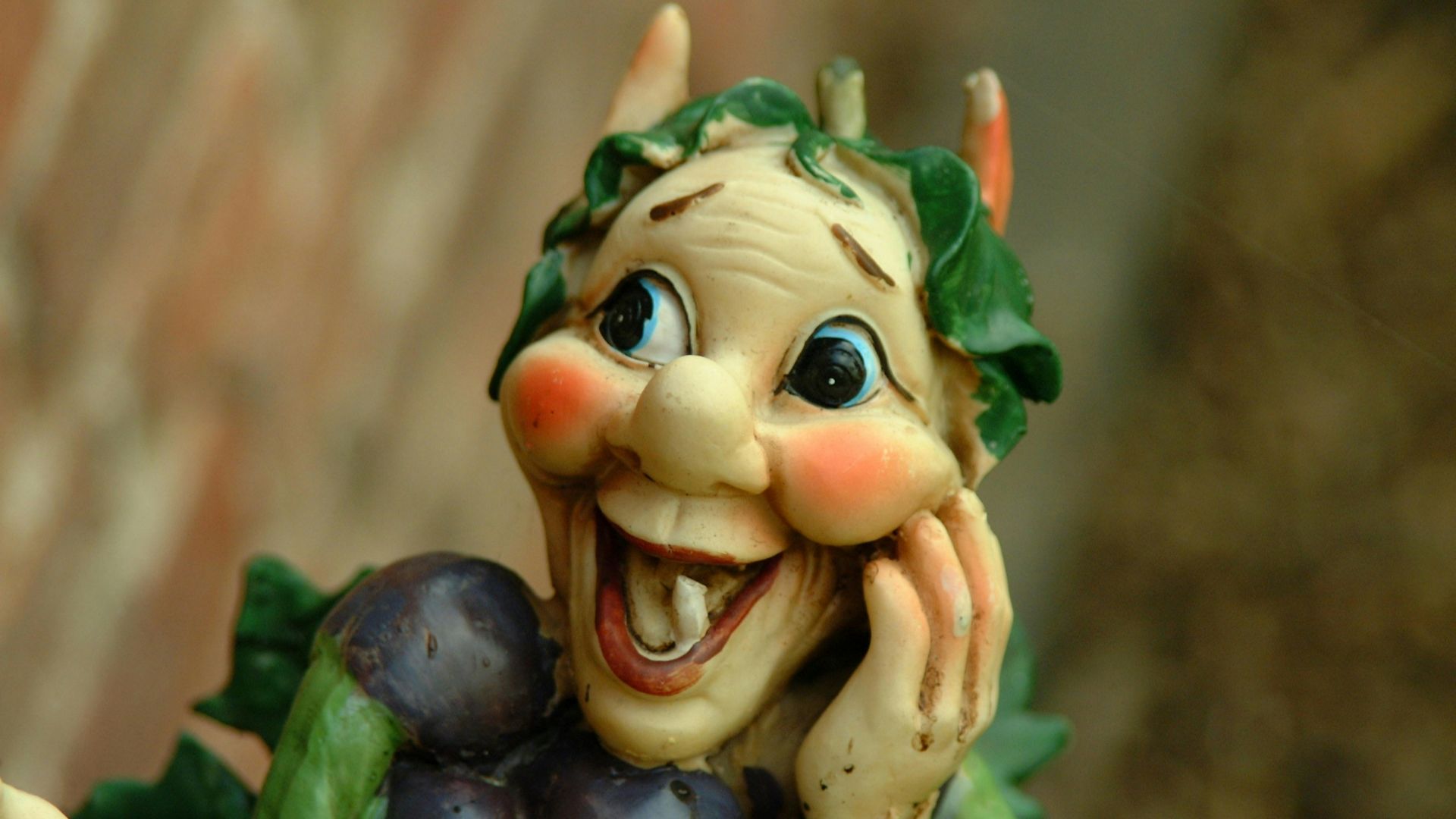 green and brown ceramic figurine