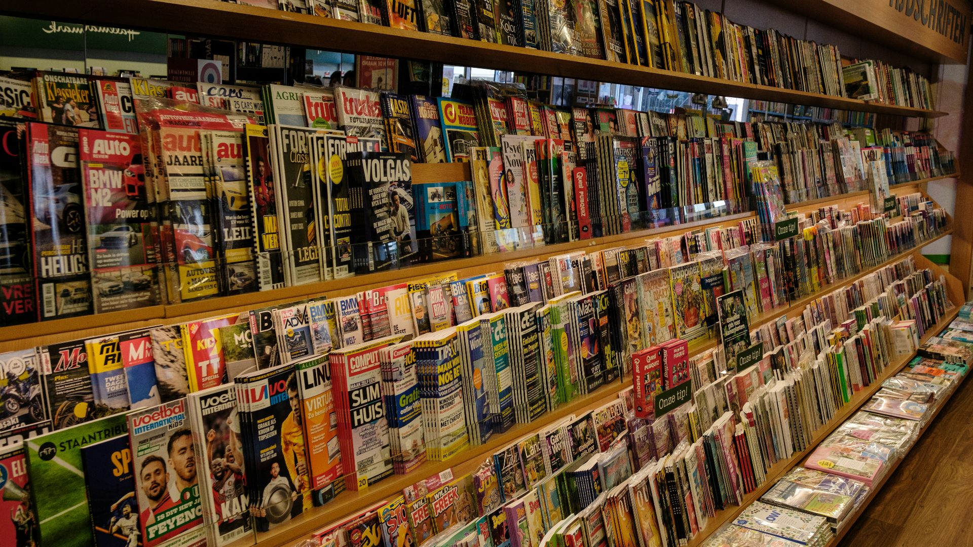 a large number of magazines are on display