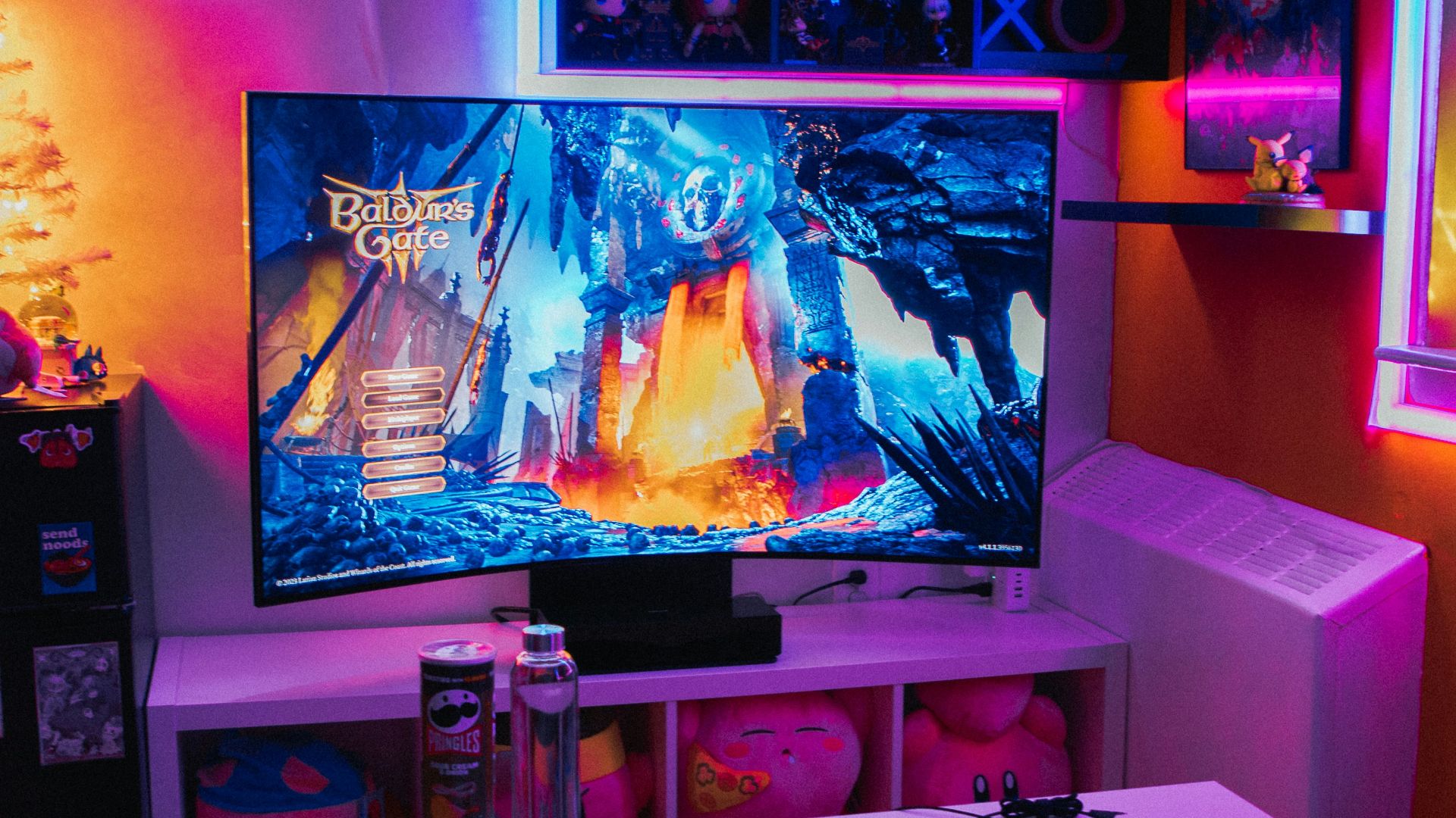 a living room with a television and a game system