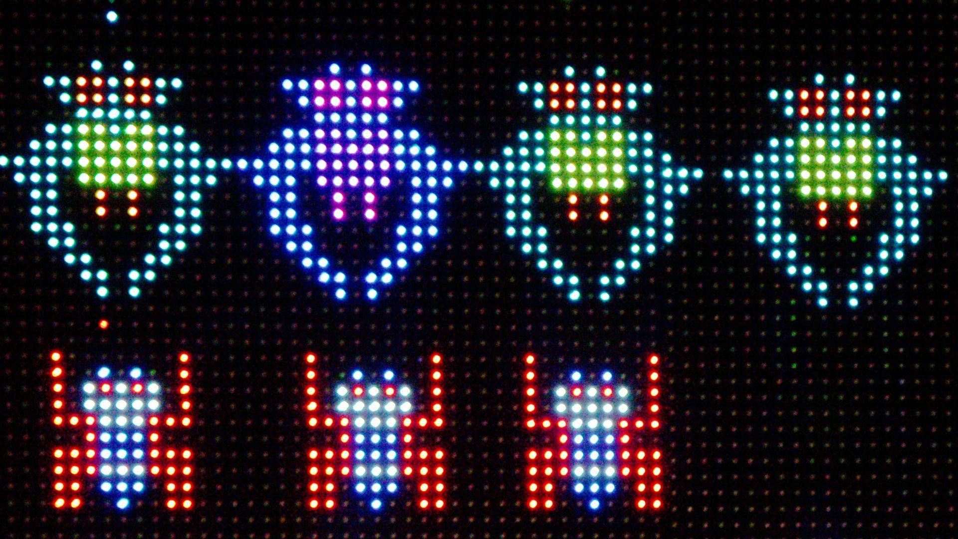 a close up of a lit up sign on a building