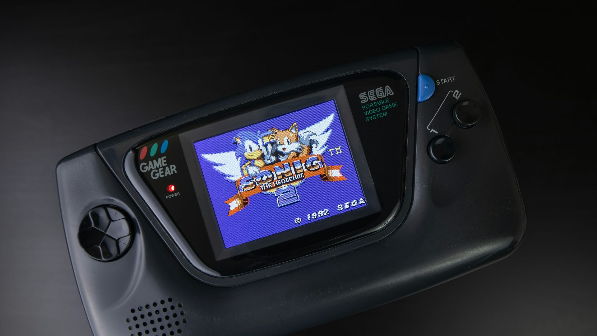 black sony digital device on black surface